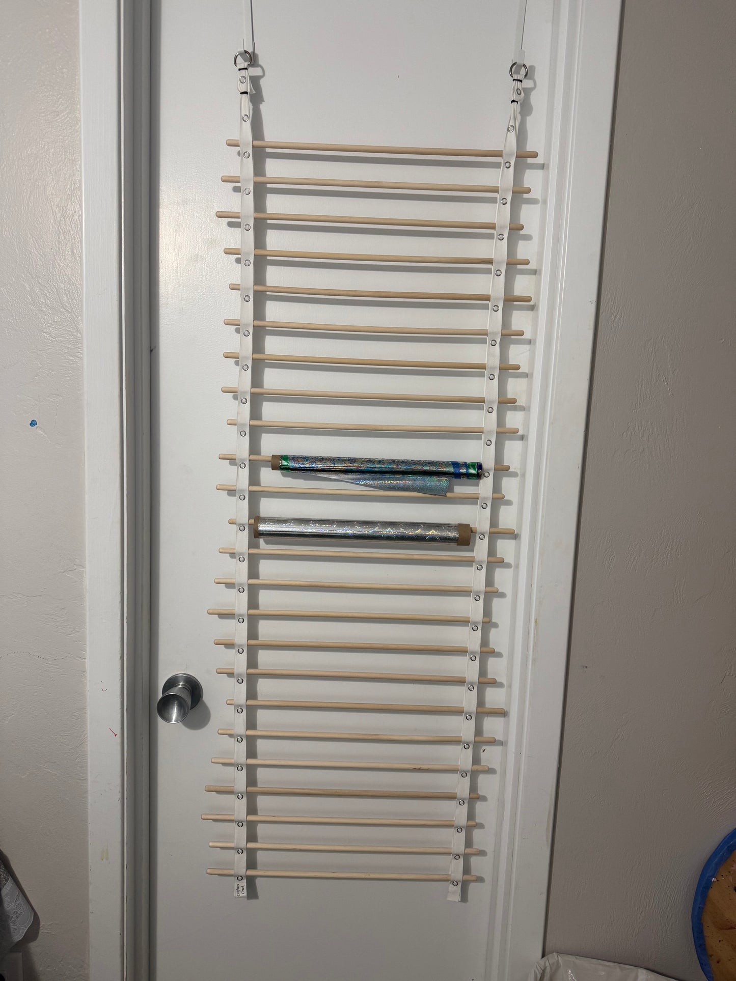 Over the Door Foil and Vinyl Hanger with 24 spindles