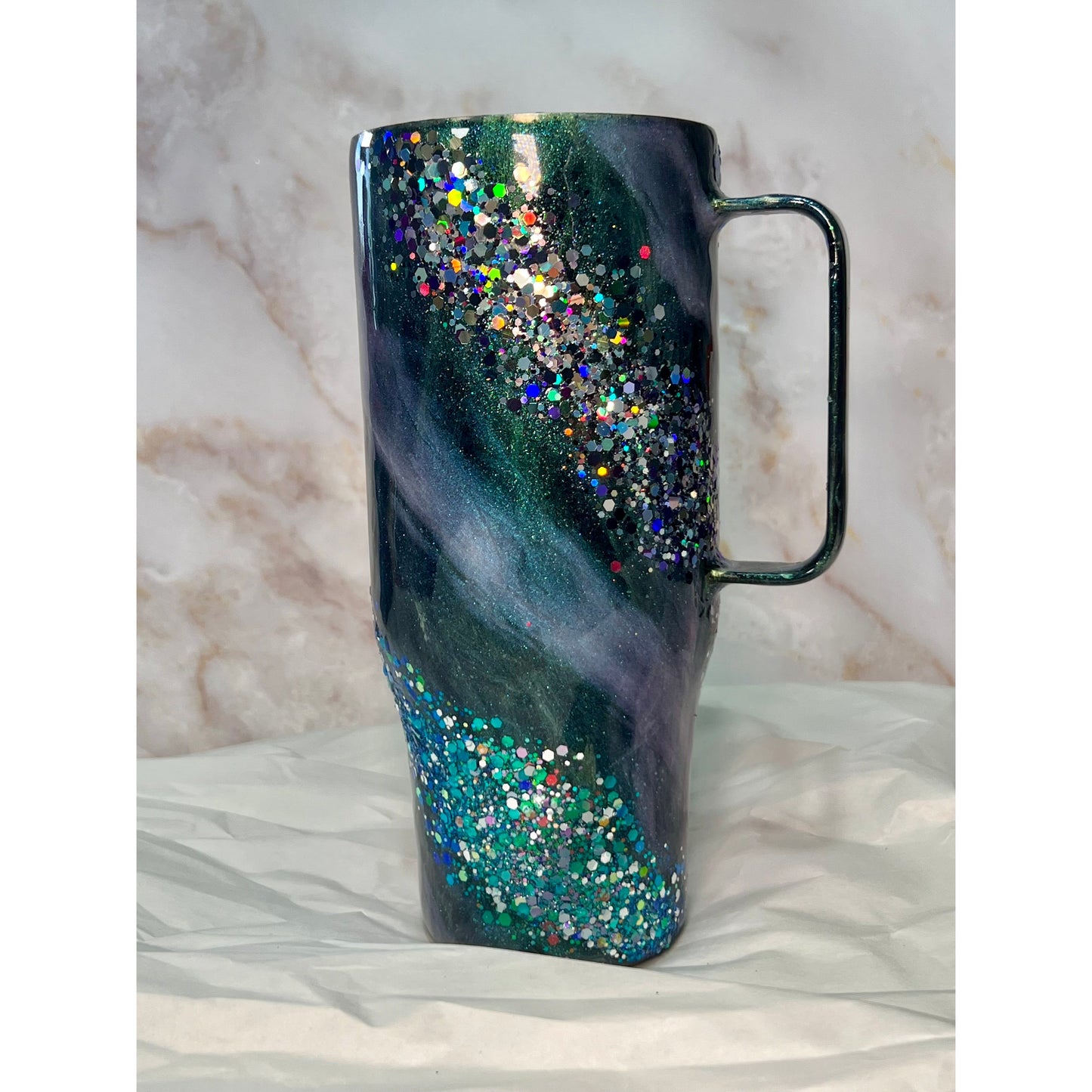 #135 Gorgeous Purple and Green Glitter and Glow on 24 oz Stainless Steel Curved Hoggdle Tumbler