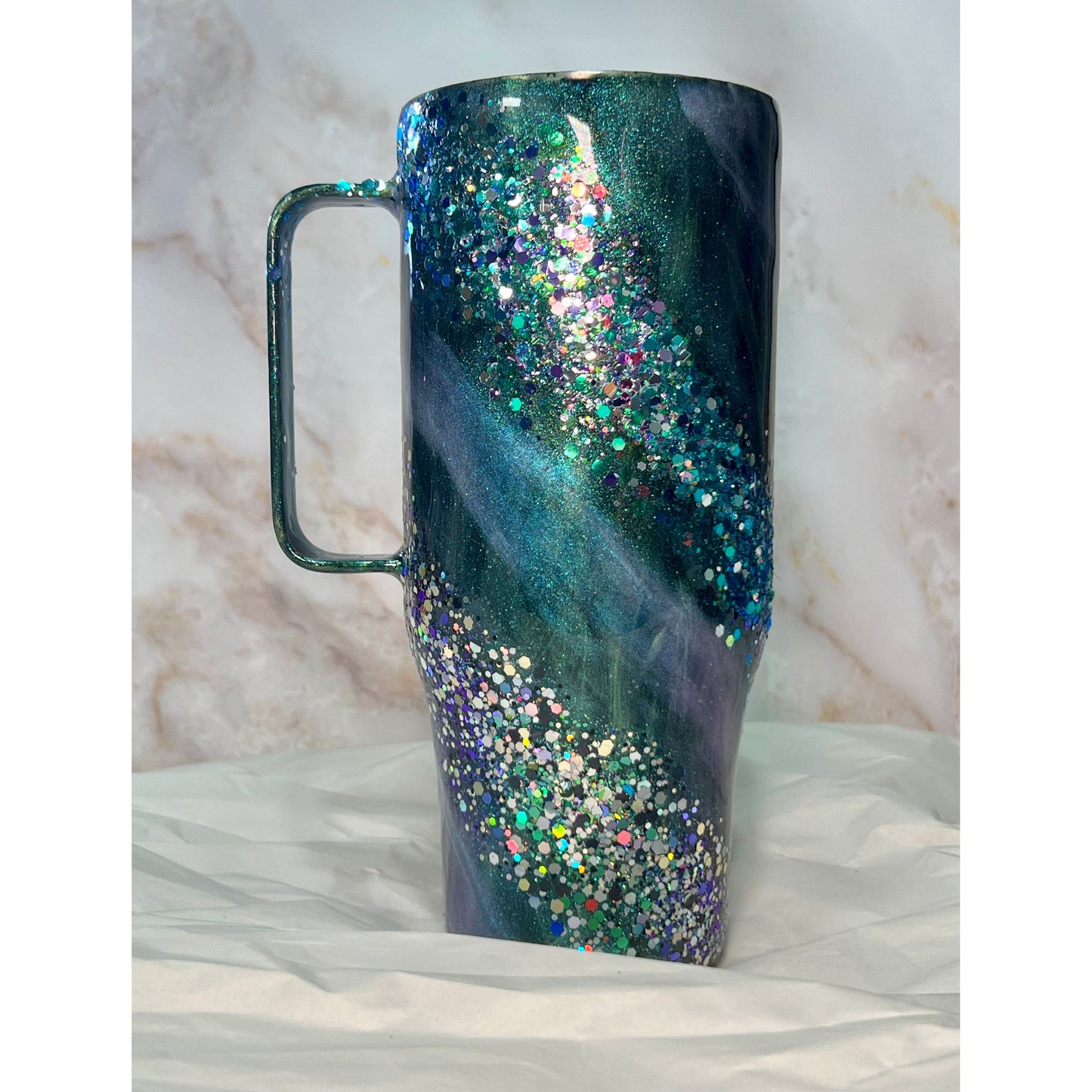 #135 Gorgeous Purple and Green Glitter and Glow on 24 oz Stainless Steel Curved Hoggdle Tumbler